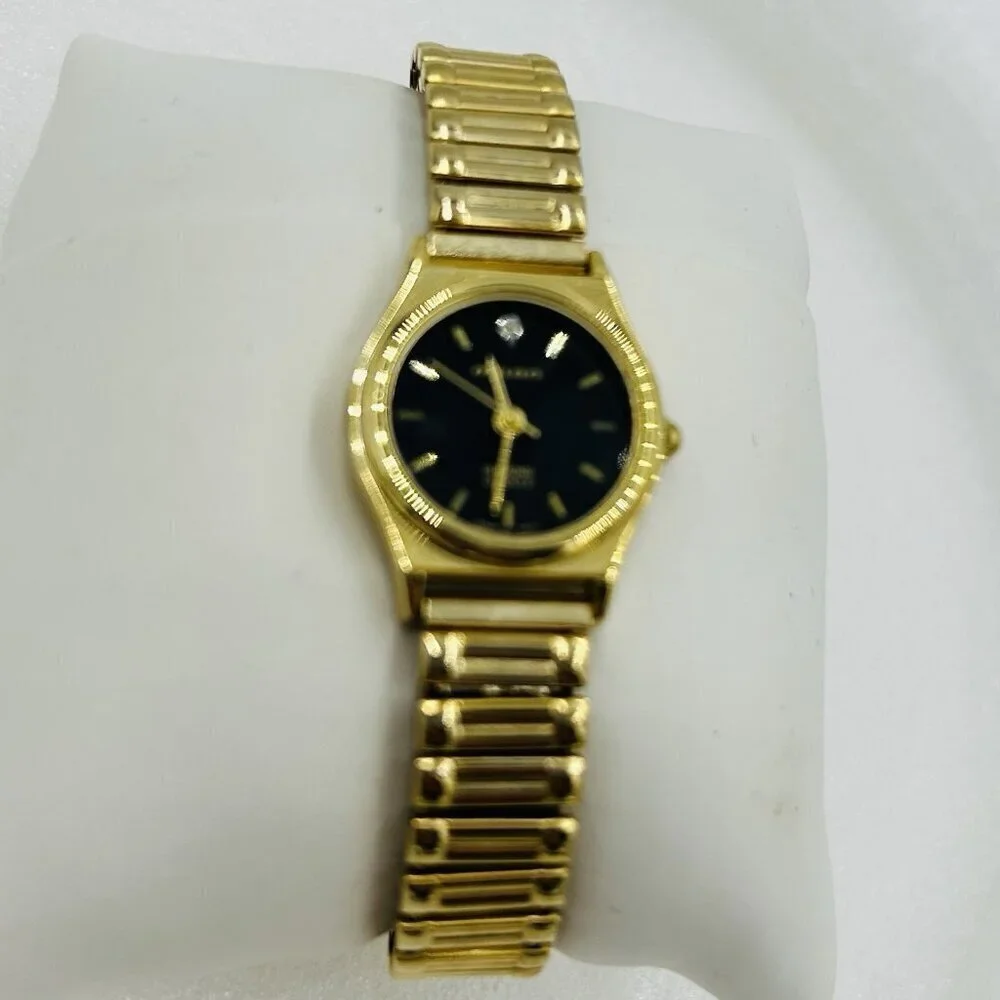 Milan Diamond Quartz Vintage Ladies Watch Gold Stretch Band Black Face